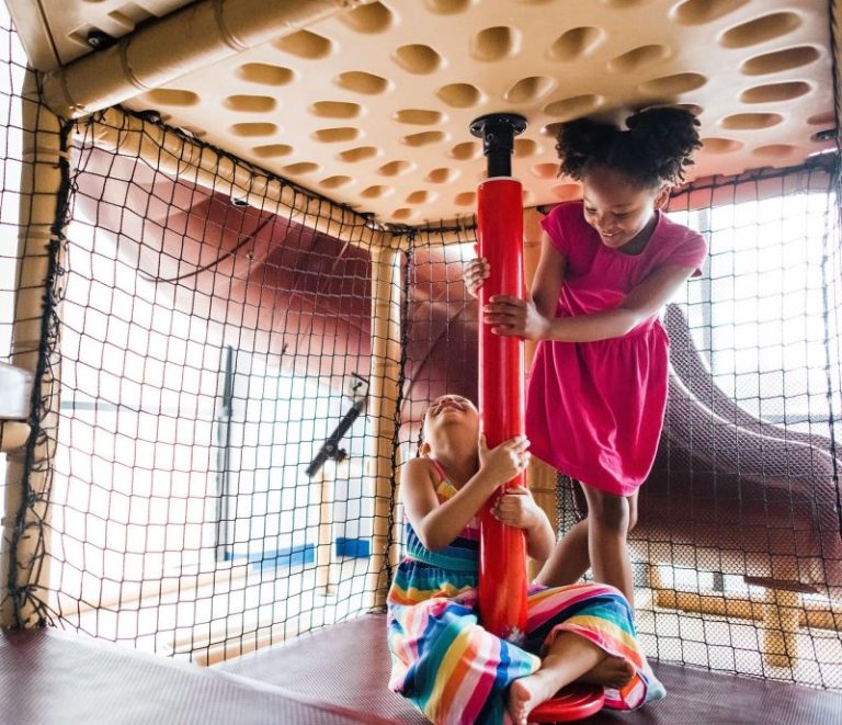Children climbing in the indoor play structure at Smile Magic in Montana Avenue, El Paso