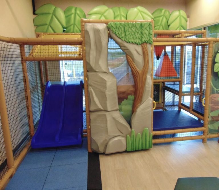 Indoor treehouse play structure at Smile Magic in Killeen