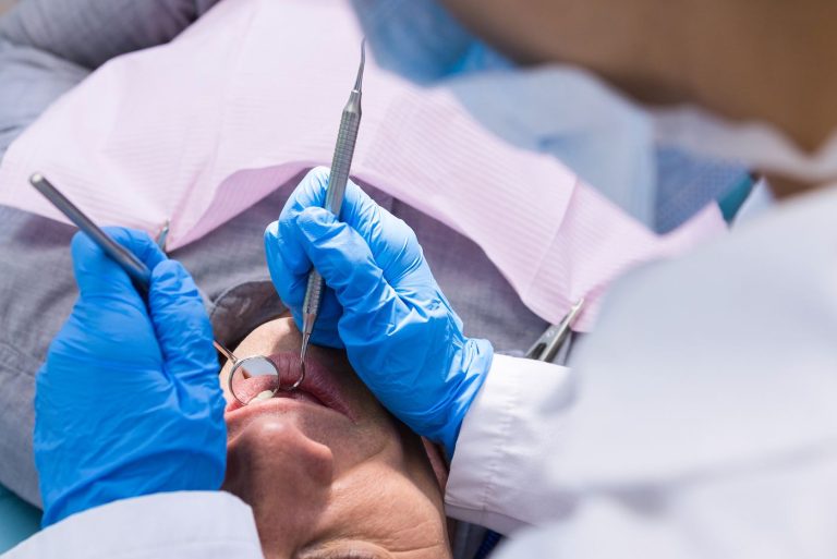 Dentist working on a patient during a restorative procedure